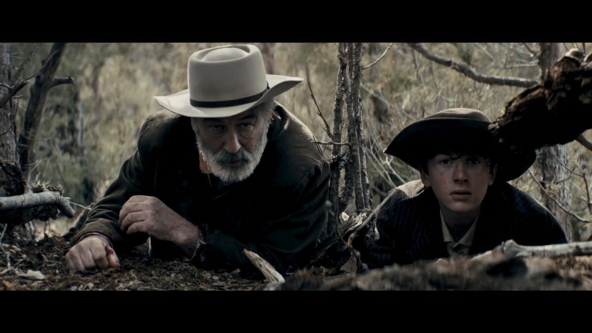 In "Rust," Alec Baldwin hunkers down with Patrick Scott McDermott. The Western is being released May 2 after many delays related to the 2021 death of cinematographer Halyna Hutchins.