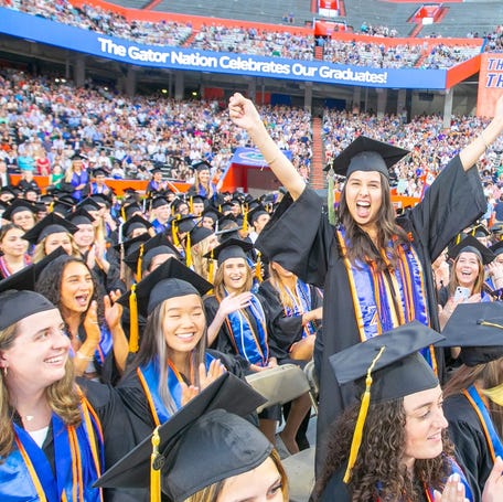 Graduates celebrate their college during the University of Florida graduation at Ben Hill Griffin Stadium in Gainesville, FL on Friday, May 3, 2024.