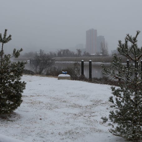 Cloudy skies and snow obscure the Wilmington skyline on Monday January 6, 2025.