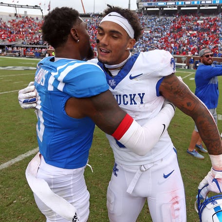 Sep 28, 2024; Oxford, Mississippi, USA; Mississippi Rebels defensive back Trey Amos (9) and Kentucky Wildcats wide receiver Dane Key (6) embrace after the game at Vaught-Hemingway Stadium. Mandatory Credit: Petre Thomas-Imagn Images