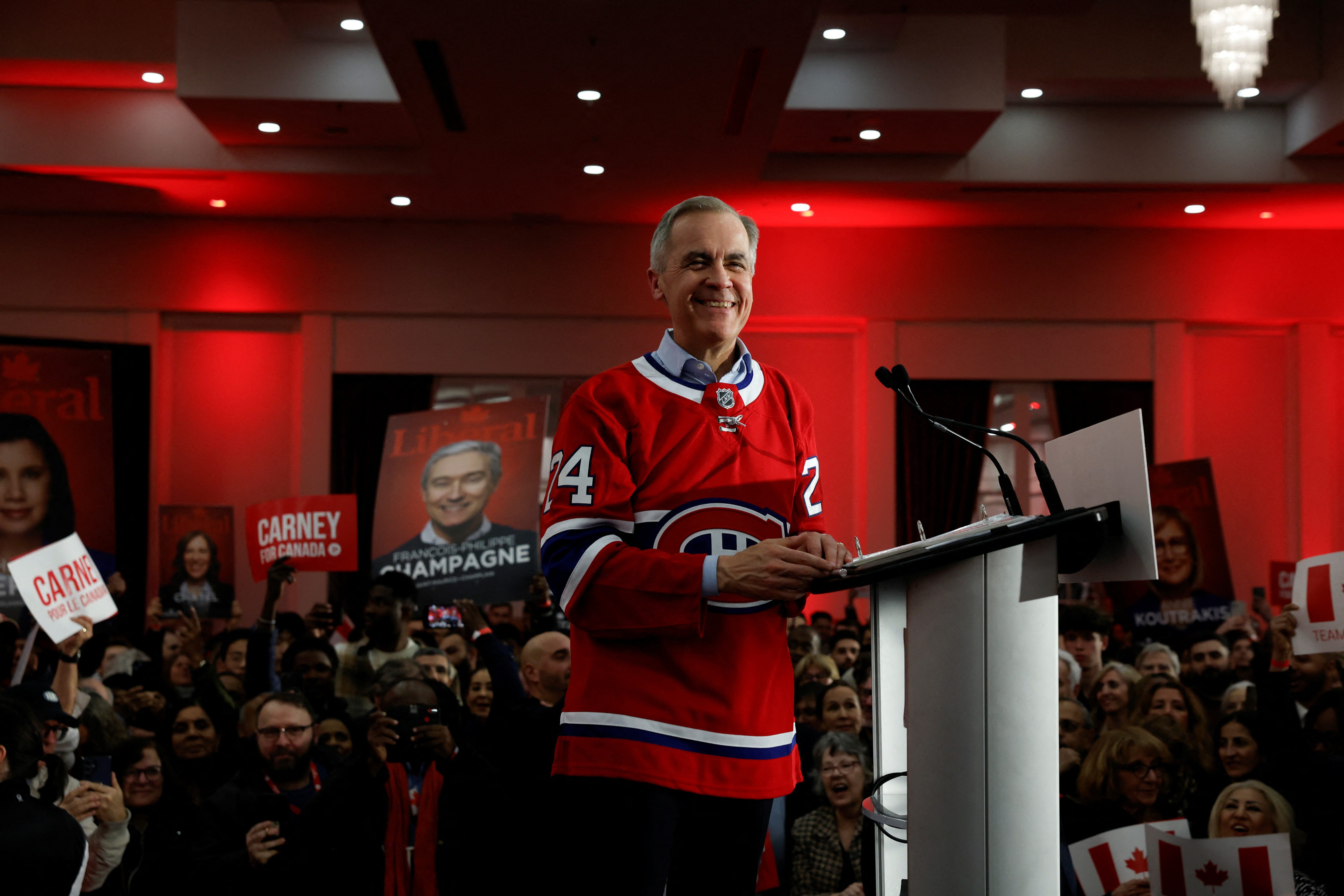 Canada's Prime Minister Mark Carney attends a rally during his Liberal Party election campaign tour in Laval, Quebec, Canada April 22, 2025. REUTERS/Carlos Osorio