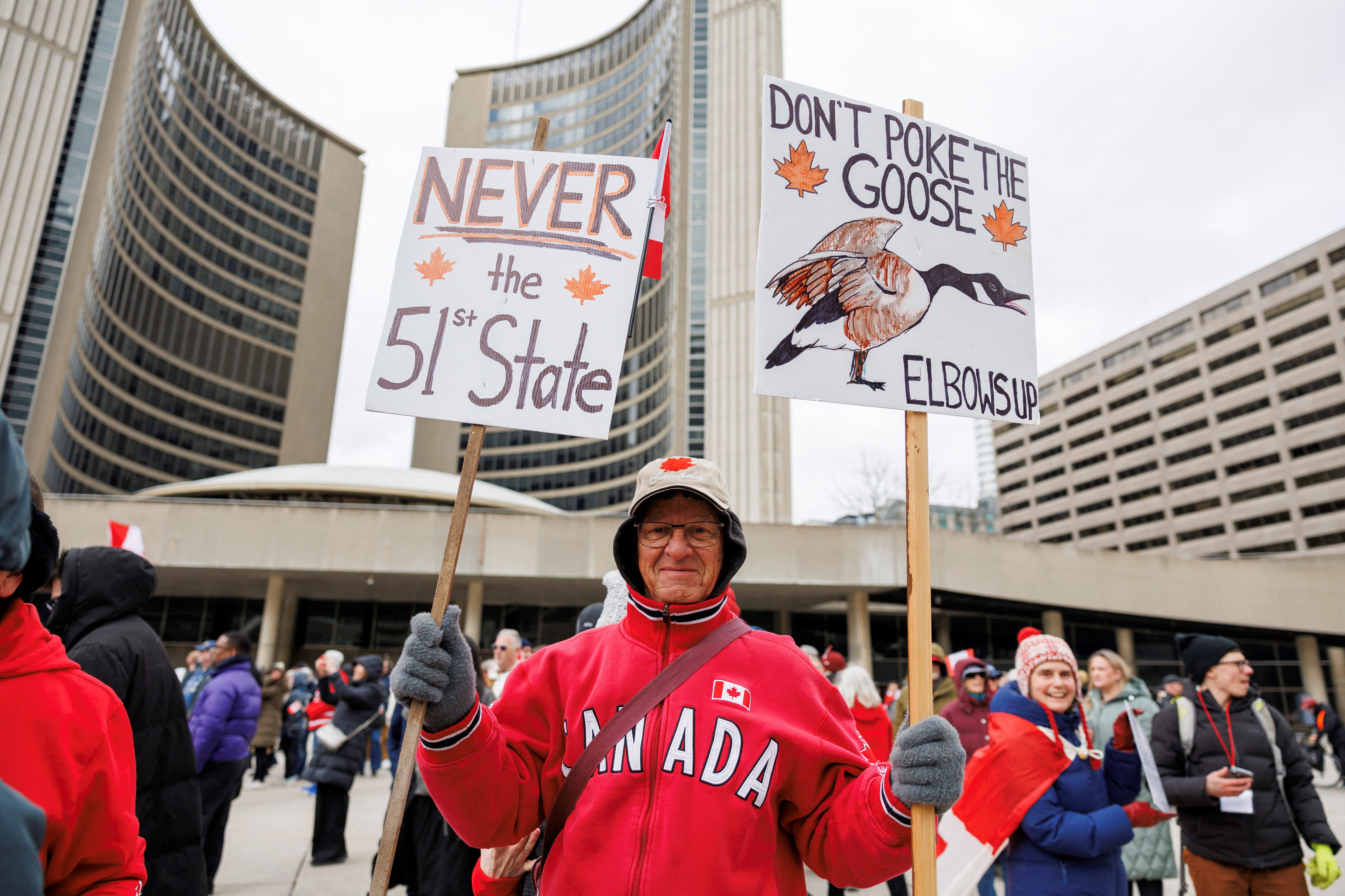 Canadians hold an "Elbows Up" protest against U.S. tariffs and other policies by U.S. President Donald Trump, at Nathan Phillips Square in Toronto, Ontario, Canada March 22, 2025. REUTERS/Carlos Osorio