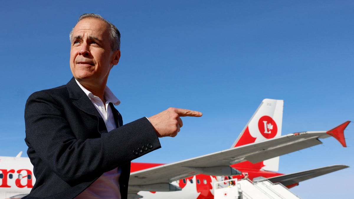 Canada's Prime Minister Mark Carney gestures at the Ottawa International Airport, during election day in Ottawa, Ontario, Canada, April 28, 2025.