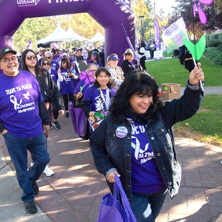 Hundreds join the fundraiser Walk to End Alzheimer's at the University of the Pacific in Stockton. An estimated 7.2 million Americans age 65 and older are living with Alzheimer's disease, a new report shows.