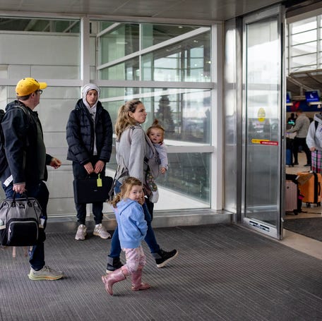 Travelers arrive to the Detroit Metropolitan Wayne County Airport (DTW) on Dec. 1, 2024 in Romulus, Michigan.