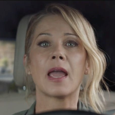Christina Applegate deals with unruly backseat passengers on her drive back from the grocery store in M&MS 2019 Super Bowl ad.