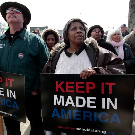 Steel workers rally in support of American workers and manufacturing jobs in River Rouge, Michigan. REUTERS/Rebecca Cook (UNITED STATES BUSINESS)