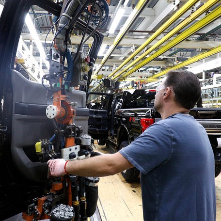 A Ford Motor Company worker works on a Ford F150 truck on the assembly line at the Ford Dearborn Truck Plant on September 27, 2018 in Dearborn, Michigan. The Ford Rouge Plant is celebrating 100 years as America's longest continuously operating auto plant.