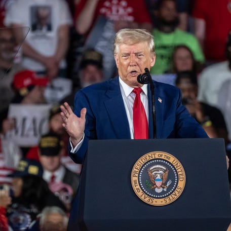 President Donald Trump speaks to a crowd during his 100TH Day in Office Achievement Rally at the Macomb on Tuesday, April 29, 2025.