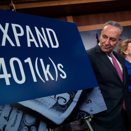WASHINGTON, DC - OCTOBER 31: (L to R) Senate Minority Leader Chuck Schumer (D-NY) and Sen. Debbie Stabenow (D-MI) attend a press conference to discuss their proposals for raising the 401(k) pre-tax contribution limits, October 31, 2017 in Washington, DC.