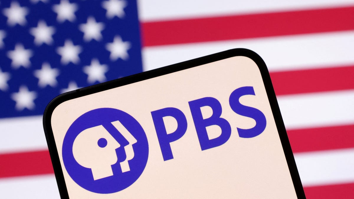 The Public Broadcasting Service (PBS) logo and the U.S. flag are seen in this illustration taken April 23, 2025.