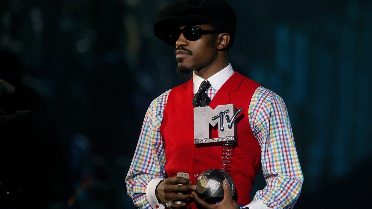 Andre 3000 of Outkast accepts an award during the MTV Europe Music Awards 2004 at Tor di Valle Nov. 18, 2004, in Rome, Italy.