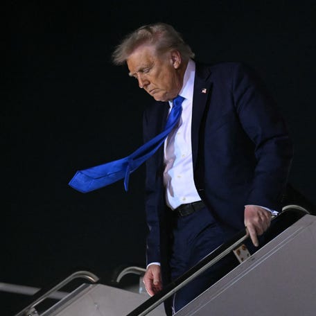 President Donald Trump disembarks from Air Force One in West Palm Beach, Florida, on May 1, 2025, to spend the weekend at his Mar-a-Lago estate.