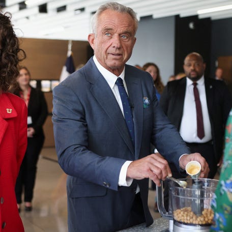 U.S. Health Secretary Robert F. Kennedy Jr. assists in making hummus during a demonstration as he visits the Osher Center for Integrative Health at the University of Utah in Salt Lake City, Utah, U.S. April 7, 2025.