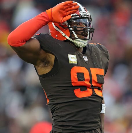 Cleveland Browns defensive end Myles Garrett celebrates after sacking Tampa Bay Buccaneers quarterback Tom Brady during the second half at FirstEnergy Stadium, Sunday, Nov. 27, 2022, in Cleveland.