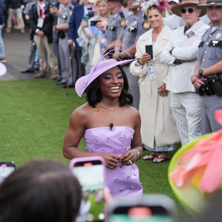 Olympian Simone Biles announced 'Riders Up' in the Paddock before the start of the 2025 Kentucky Derby Saturday, May 3 at Churchill Downs in Louisville, Kentucky.