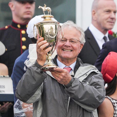 Trainer Bill Mott celebrates after Sovereignty won the Kentucky Derby on Saturday.
