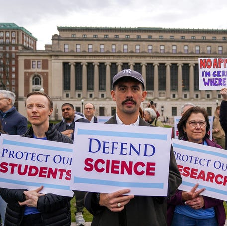 Members of the Columbia Medical physicians, nurses, researchers and faculty protest against federal funding cuts in New York City on April 14, 2025.