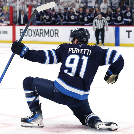 The Winnipeg Jets' Cole Perfetti (91) celebrates after his goal against the St. Louis Blues.