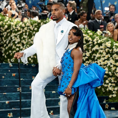 Olympic gymnast Simone Biles and husband, NFL star Jonathan Owens attend the 2025 Met Gala at the Metropolitan Museum of Art in New York.