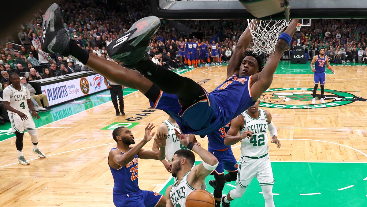 OG Anunoby dunks over Jayson Tatum during Game 1 of their Eastern Conference semifinal series.