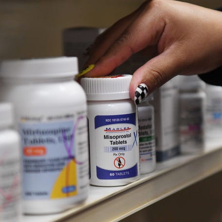 Luz Camcho, system manager, places Misoprostol on the shelf at Parker Road Drug Store in Greenville, S.C., on Thursday, June 13, 2024. Misoprostol is used alongside Mifespristone, also known as the "abortion pill."