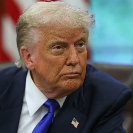 U.S. President Donald Trump looks on as he signs executive orders and proclamations in the Oval Office at the White House, in Washington, D.C., U.S., May 5, 2025. REUTERS/Leah Millis