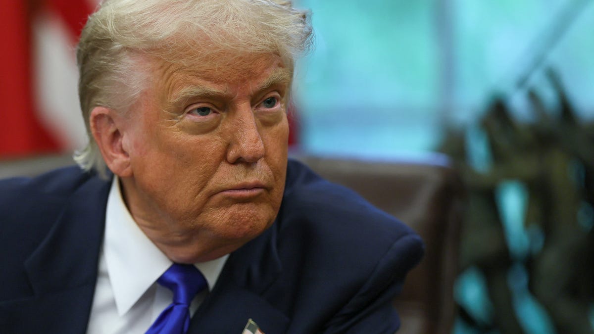 U.S. President Donald Trump looks on as he signs executive orders and proclamations in the Oval Office at the White House, in Washington, D.C., U.S., May 5, 2025. REUTERS/Leah Millis