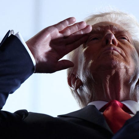 Football - NFL - Super Bowl LIX - Philadelphia Eagles v Kansas City Chiefs - Caesars Superdome, New Orleans, Louisiana, United States - February 9, 2025 U.S. President Donald Trump salutes before the game REUTERS/Evelyn Hockstein  TPX IMAGES OF THE DAY