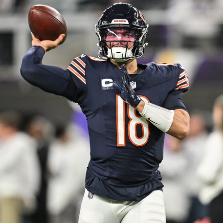 Chicago Bears quarterback Caleb Williams (18) warms up before the game against the Minnesota Vikings at U.S. Bank Stadium in Minneapolis on Dec. 16, 2024.