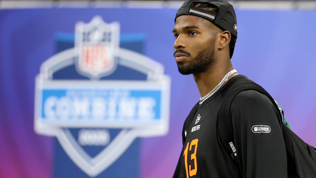 INDIANAPOLIS, INDIANA - MARCH 01: Shedeur Sanders #QB13 of Colorado looks on during the NFL Scouting Combine at Lucas Oil Stadium on March 01, 2025 in Indianapolis, Indiana. (Photo by Stacy Revere/Getty Images)