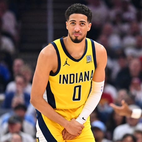 Tyrese Haliburton holds his wrist during the second quarter of Game 2.
