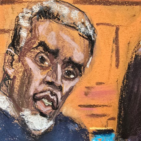 Sean "Diddy" Combs sits with his legal team as U.S. District Judge Arun Subramanian interviews potential jurors at the start of his sex trafficking trial in New York City, New York, U.S., May 5, 2025 in this courtroom sketch. REUTERS/Jane Rosenberg