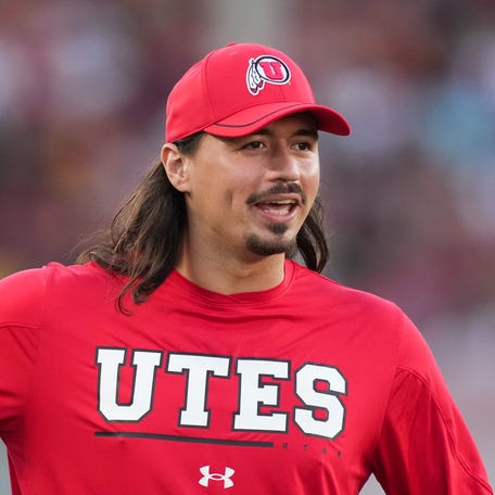 Utah Utes quarterback Cam Rising reacts against the Southern California Trojans at United Airlines Field at Los Angeles Memorial Coliseum.