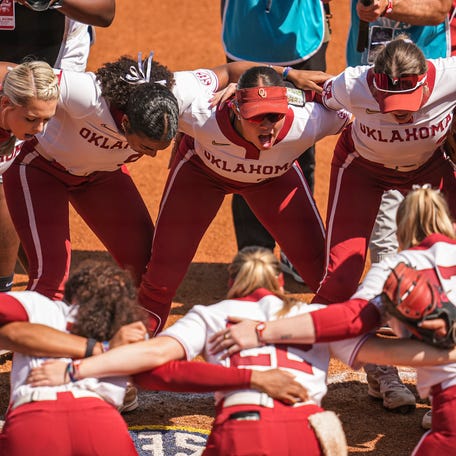 May 8, 2025; Athens, GA, USA; Oklahoma players react on the field prior to the game against LSU at Jack Turner Stadium. Mandatory Credit: Dale Zanine-Imagn Images