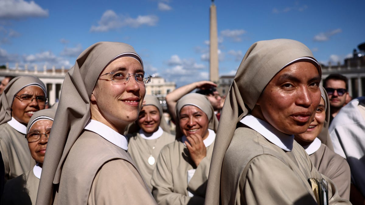 Nuns gather in St. Peter's Square, on the second day of the conclave to elect the new pope at the Vatican, May 8, 2025.