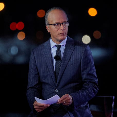 "NBC Nightly News" anchor Lester Holt hosts an NBC News town hall event with then-Vice President Joe Biden in Miami on Oct. 5, 2020.