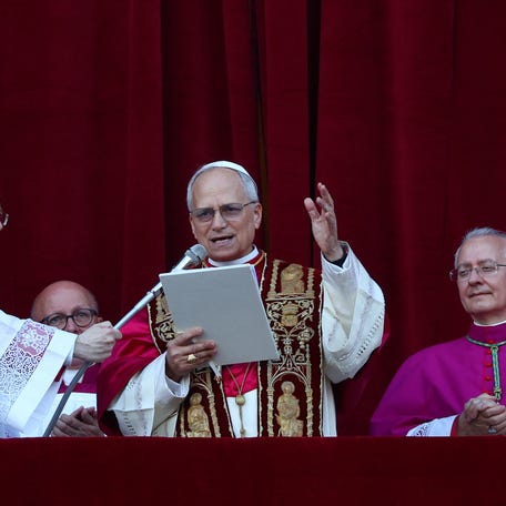 Newly elected Pope Leo XIV, Cardinal Robert Prevost of the Unites States delivers the "Urbi et Orbi" (to the city and to the world) message from the balcony of St. Peter's Basilica, at the Vatican, May 8, 2025. REUTERS/Guglielmo Mangiapane
