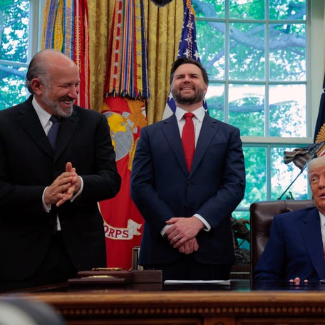 U.S. President Donald Trump along with (L-R) US Secretary of Commerce Howard Lutnick, Vice President JD Vance and Peter Mandelson, British Ambassador to the United States (R) address reporters in the Oval Office at the White House on May 08, 2025 in Washington, DC. During his remarks Trump spoke about a trade deal with the United Kingdom that he announced today.