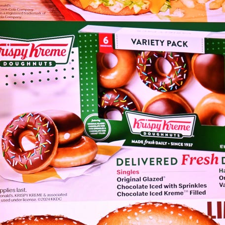 Krispy Kreme menu offerings seen at a McDonald's drive-thru in November 2024, months after the partnership was first announced.