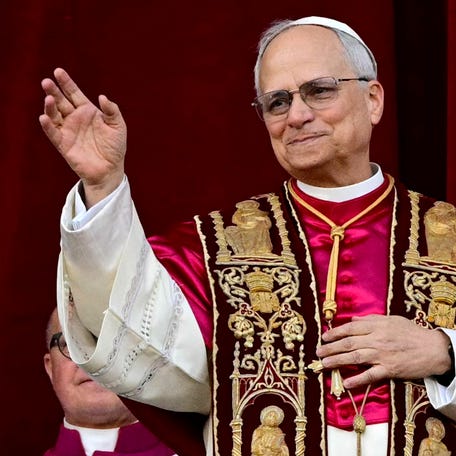 Newly elected Pope Leo XIV, Robert Prevost from the main central loggia balcony of the St Peter's Basilica for the first time, after the cardinals ended the conclave, in The Vatican, on May 8, 2025.