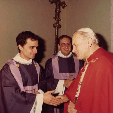 Undated picture of Robert Prevost, now Pope Leo XIV, with late former Pope John Paul II.