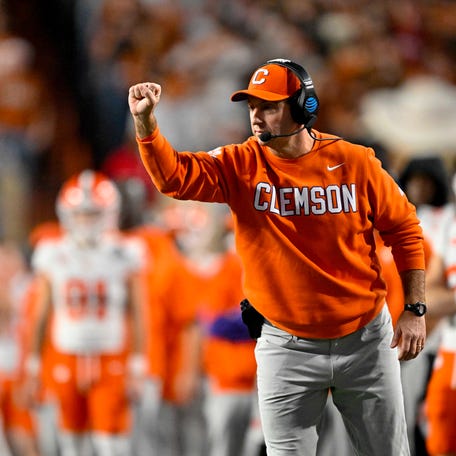 Dec 21, 2024; Austin, Texas, USA; Clemson Tigers head coach Dabo Swinney motions to his team during the second half of the game against the Texas Longhorns in the CFP National Playoff first round game at Darrell K Royal-Texas Memorial Stadium. Mandatory Credit: Jerome Miron-Imagn Images