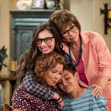 Isabella Gomez as Elena, Justina Machado as Penelope, Rita Moreno as Lydia and Marcel Ruiz as Alex in "One Day at a Time."