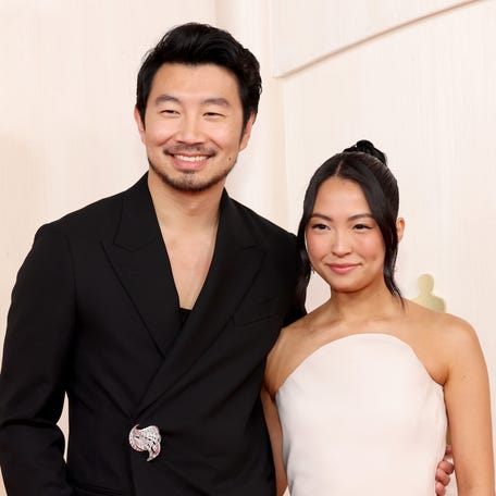 Simu Liu, left, and Allison Hsu attend the Academy Awards on March 10, 2024.