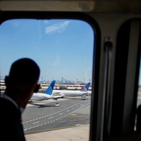 Planes are seen on the tarmac after an air traffic control outage, bringing flights to a standstill at Newark International Airport in Newark, New Jersey, U.S., May 11, 2025. REUTERS/Eduardo Munoz