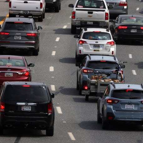 Heavy outgoing traffic moves toward the Chesapeake Bay Bridge on the eve of Memorial Day long weekend May 28, 2021 in Annapolis, Maryland.