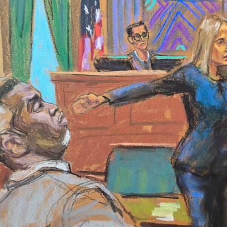 Prosecutor Emily Johnson points to Sean "Diddy" Combs before U.S. District Judge Arun Subramanian at Combs' sex trafficking trial in New York City on May 12, 2025, in this courtroom sketch.