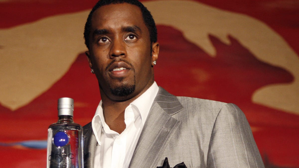 Sean "Diddy" Combs holds a bottle of Ciroc Vodka made by Diageo 24 October 2007 after announcing an alliance with the vodka brand in New York. Sean Combs Enterprises will make branding decisions for Ciroc and will share in future profits.   AFP PHOTO/Stan HONDA (Photo by STAN HONDA / AFP) (Photo by STAN HONDA/AFP via Getty Images)