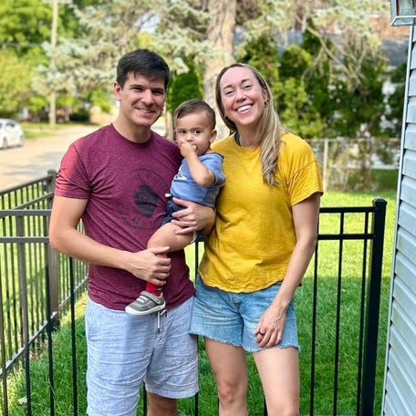 Caitie Goddard poses with her family in Royal Oak, Michigan in 2024. She is considering running for public office after being laid off in the Trump administration's overhaul of the federal workforce.